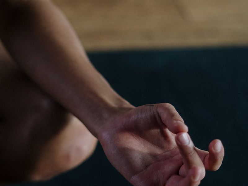 Detailed shot of hands in a yoga mudra position
