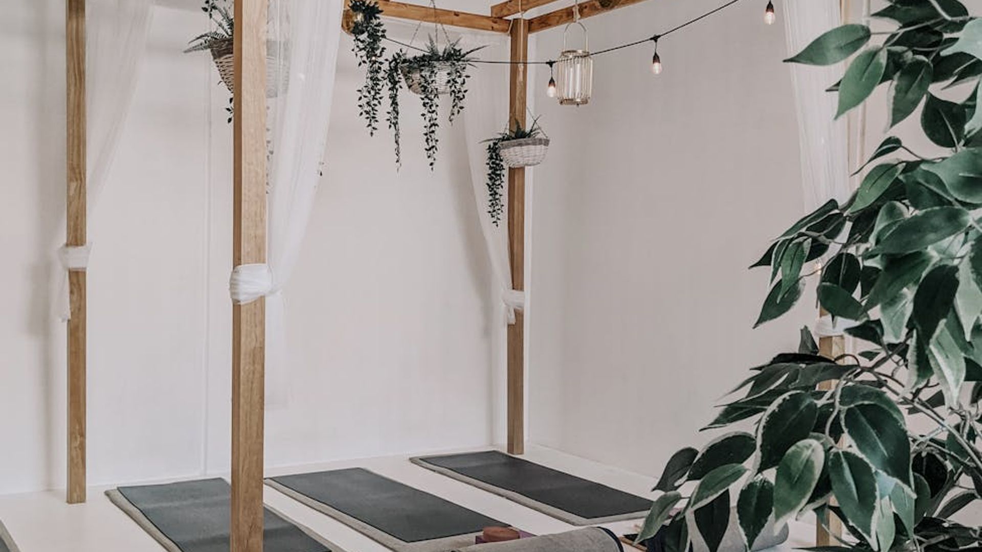 Serene yoga studio atmosphere with soft lighting